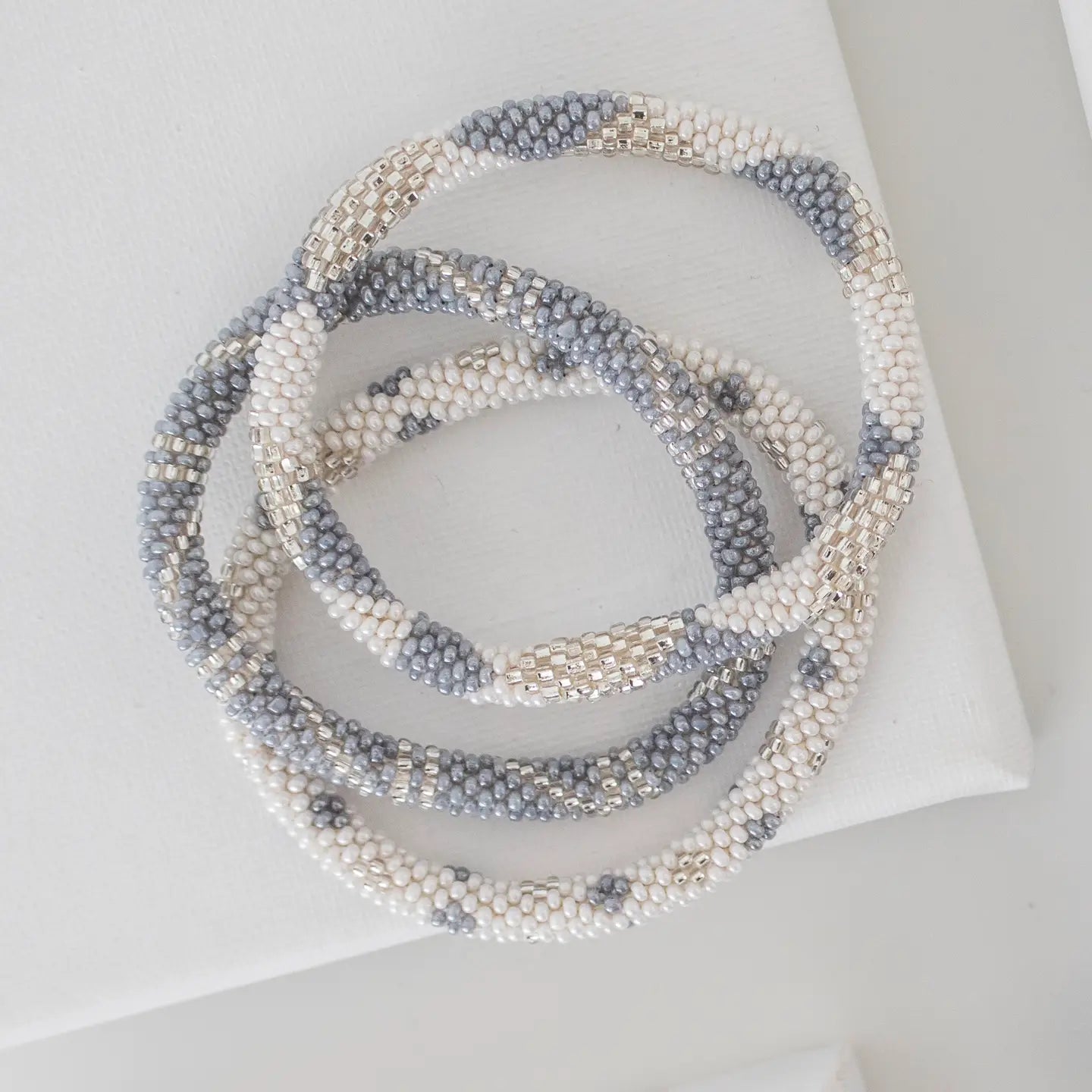 aid through trade | roll on bracelet | first mate