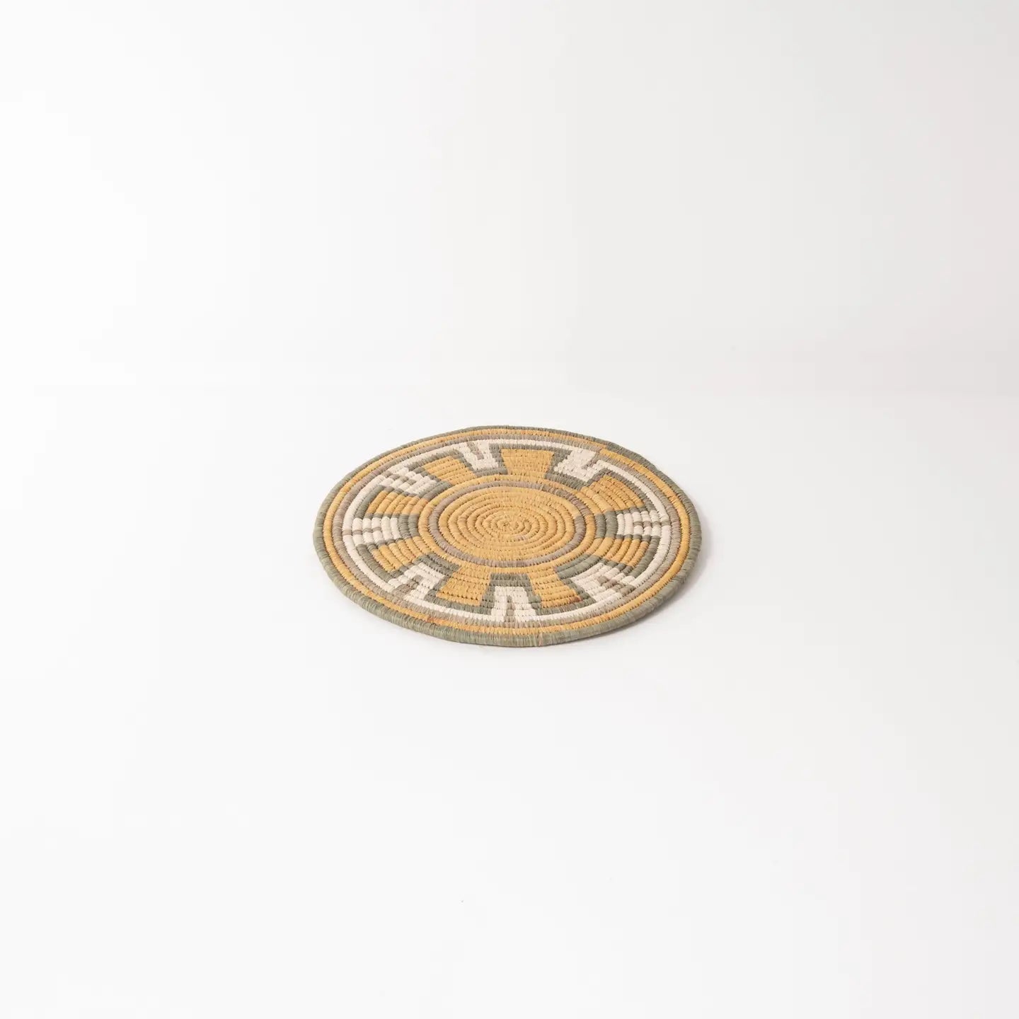 "Sprocket” woven trivet | Elevate