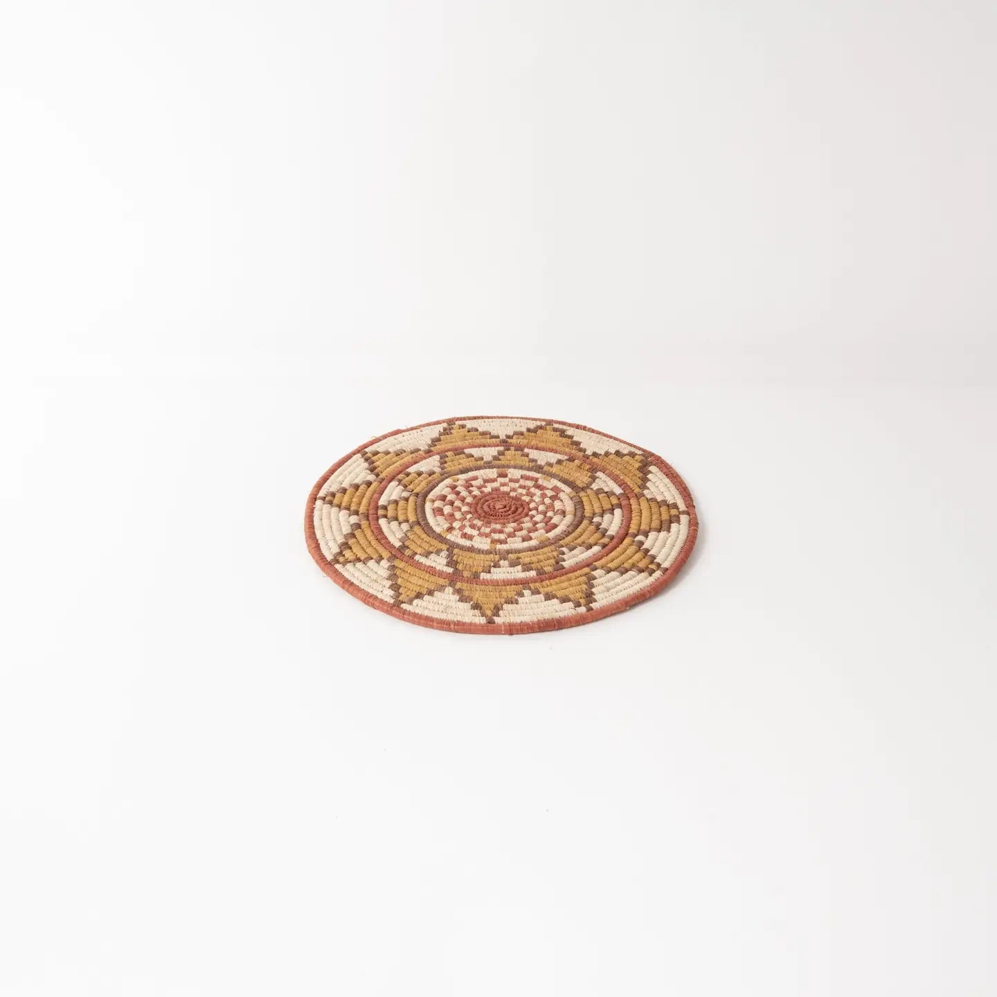 "Radiate” woven trivet | Elevate