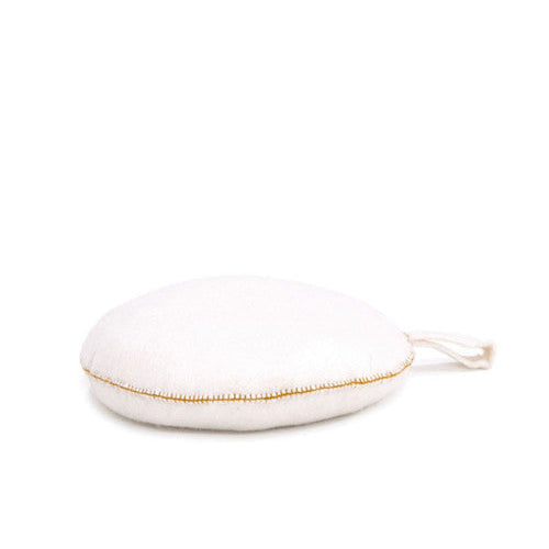 White round pouch with gold zipper on a white background