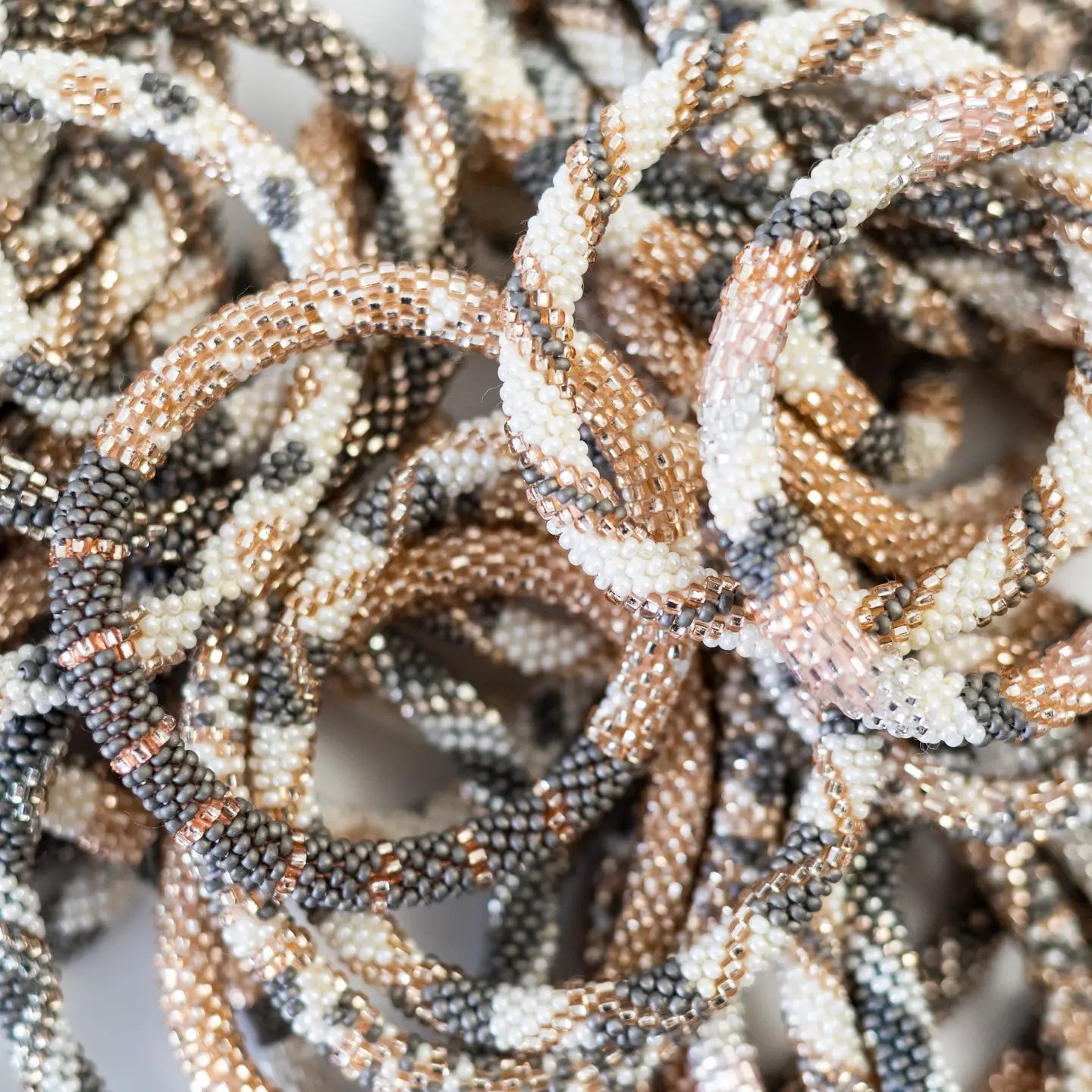 aid through trade | roll on bracelet | bubbly