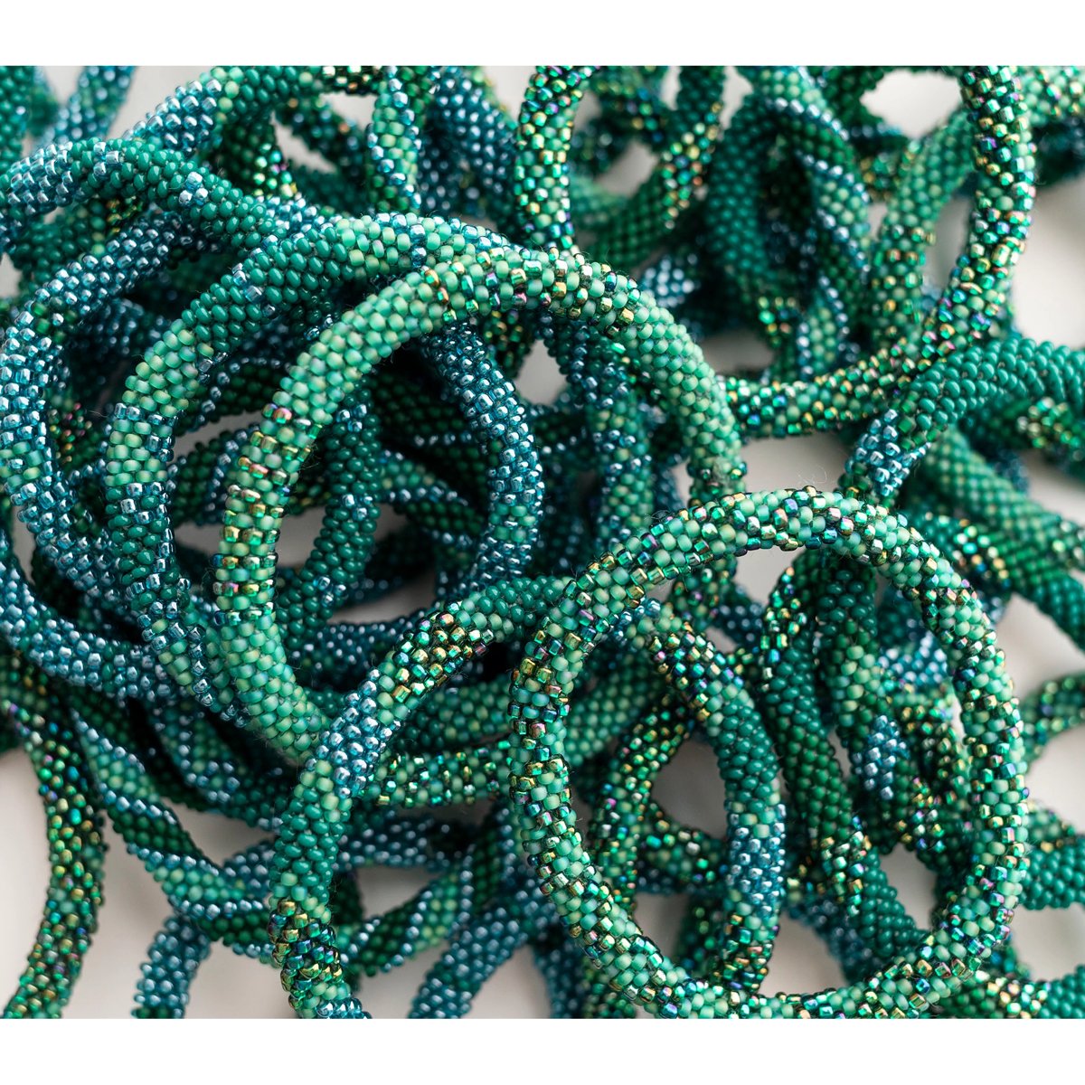 mondocherry - aid through trade | roll on bracelet | aurora - close