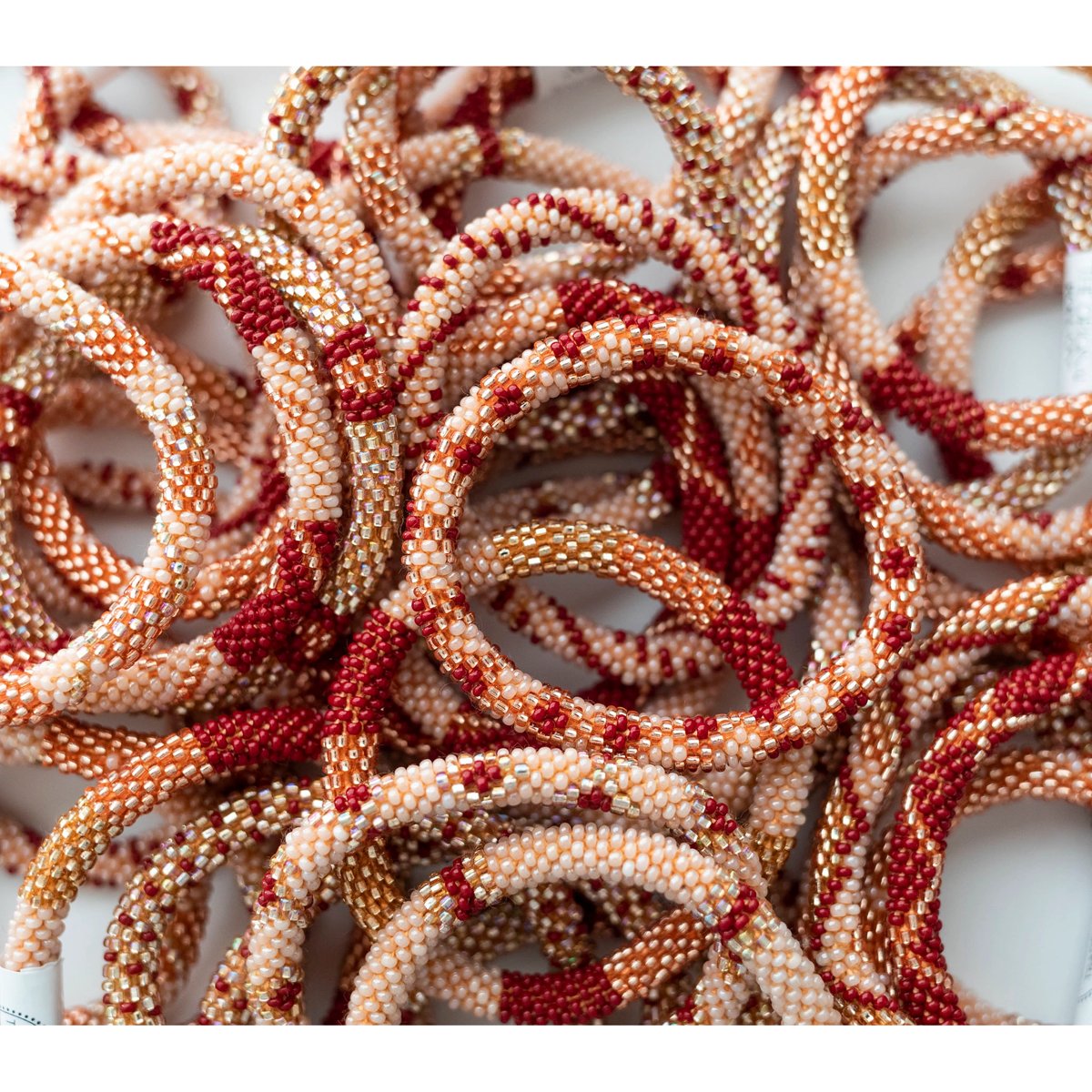 mondocherry - aid through trade | roll on bracelet | rosewood - close