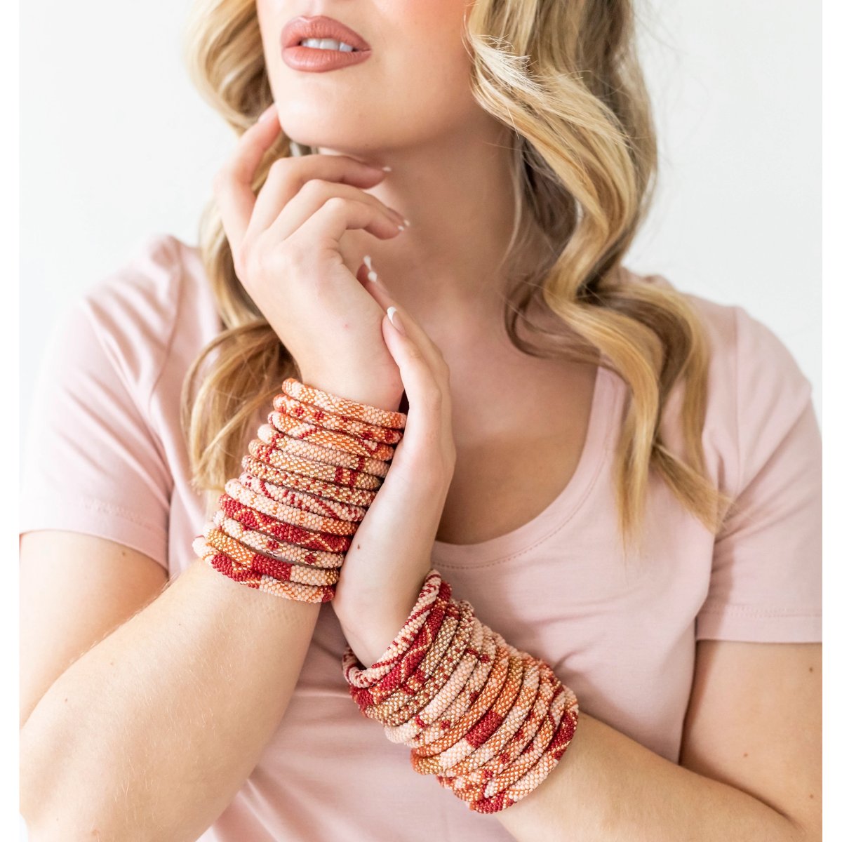 mondocherry - aid through trade | roll on bracelet | rosewood - wearing