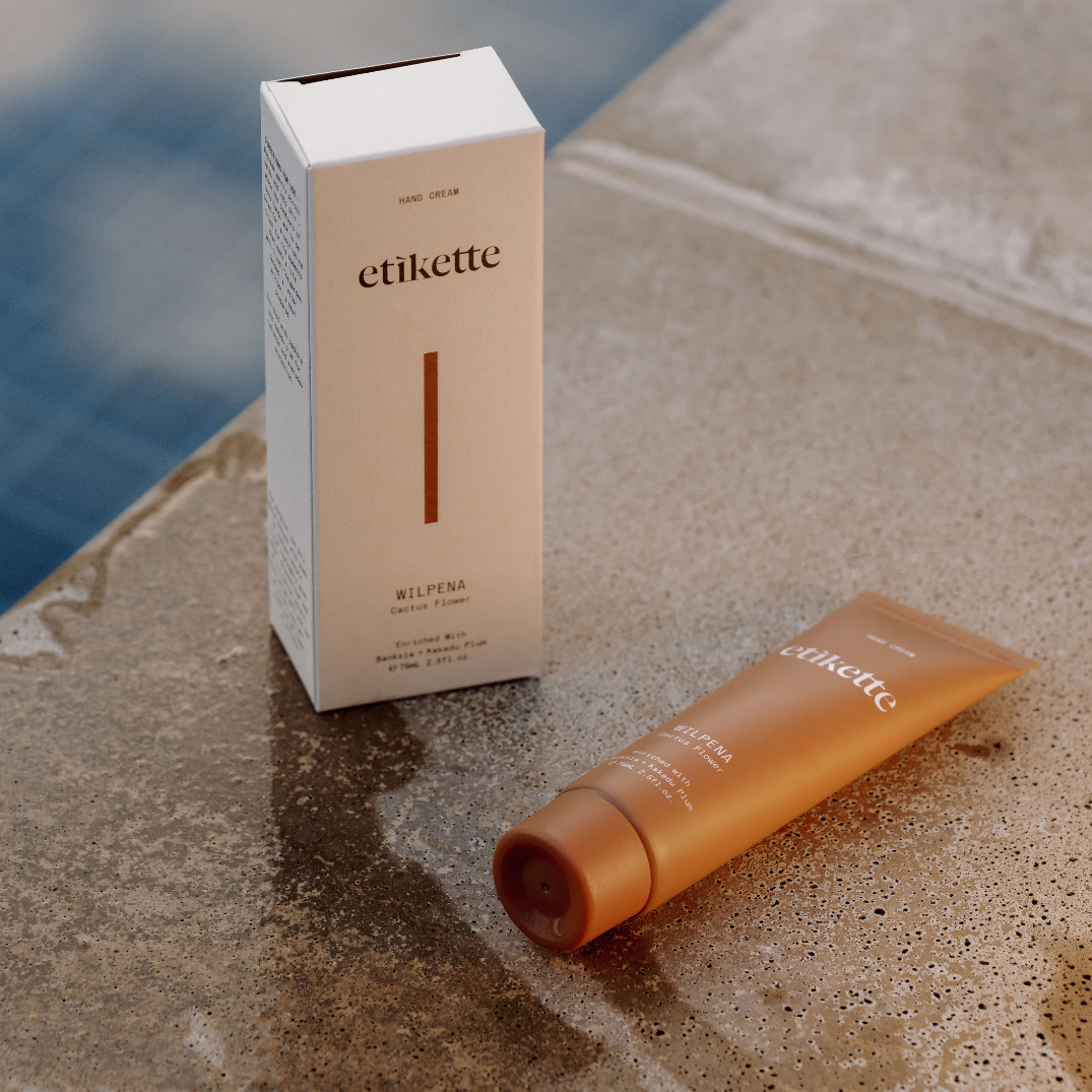 Etikette — hand cream — Wilpena in cactus flower — tube and carton on a bench