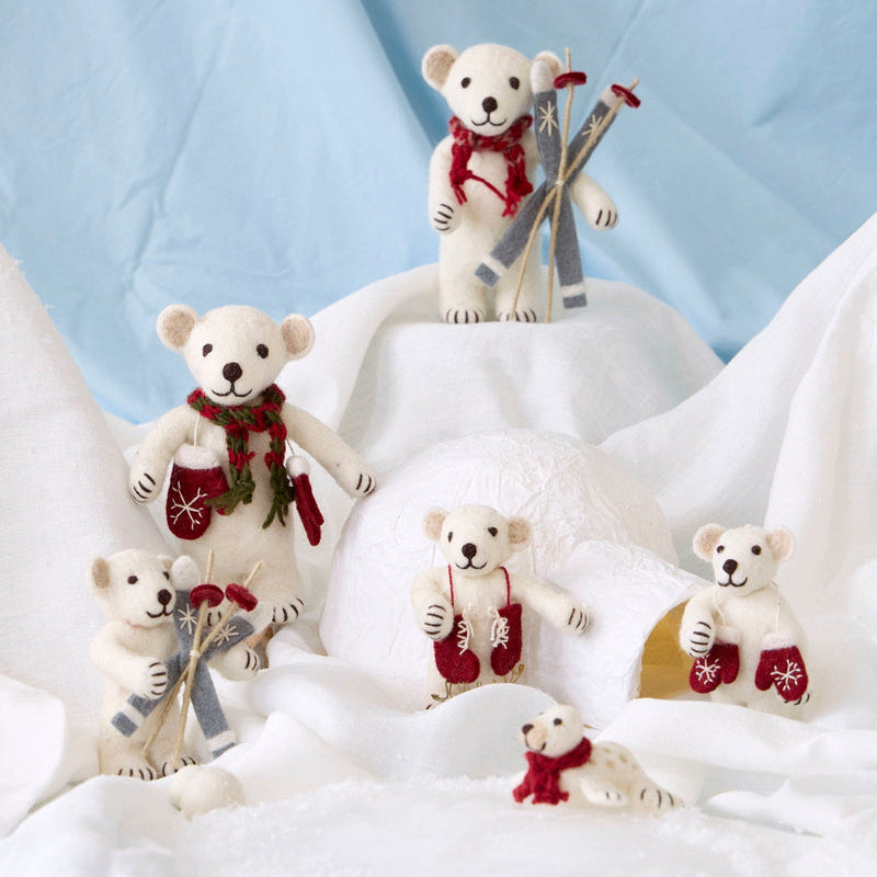 Gry & Sif — polar bear with mittens — medium — polar bear family arranged with a felt tree on snowy white fabric