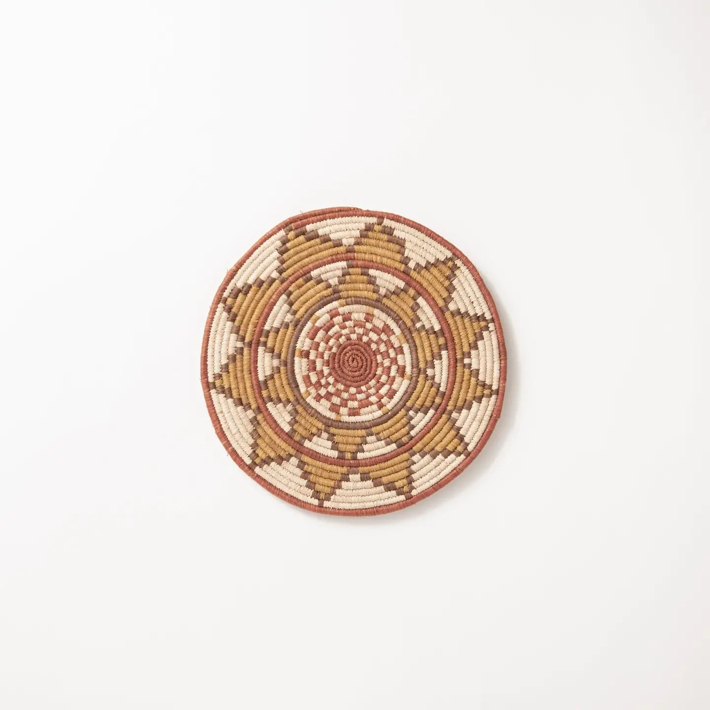 "Radiate” woven trivet | Elevate