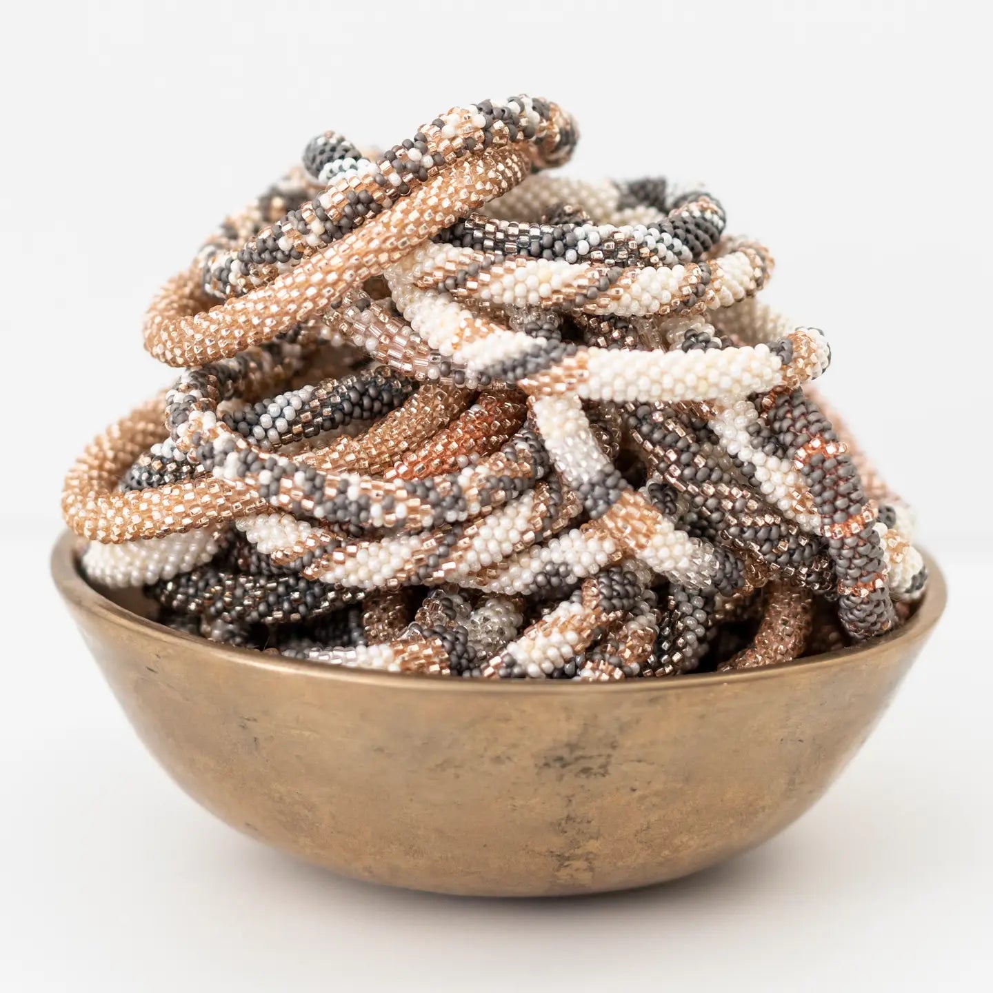 aid through trade | roll on bracelet | bubbly