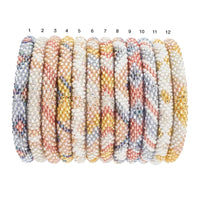 mondocherry - aid through trade | roll on bracelet | glitter - numbered