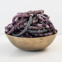 mondocherry - aid through trade | roll on bracelet | wildflower - bowl