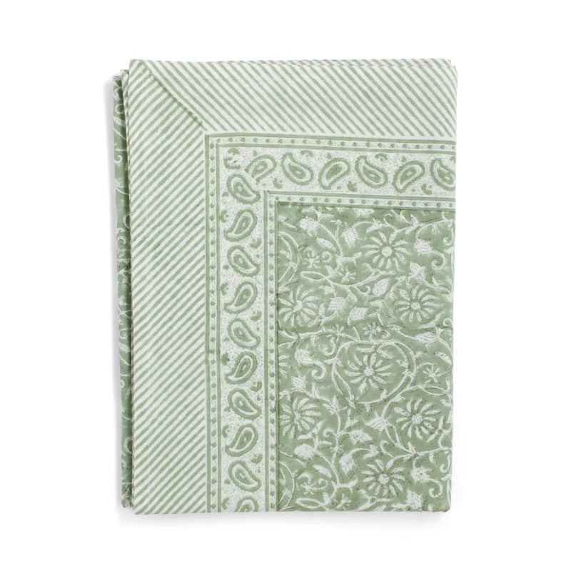Green floral patterned tablecloth with stripes.