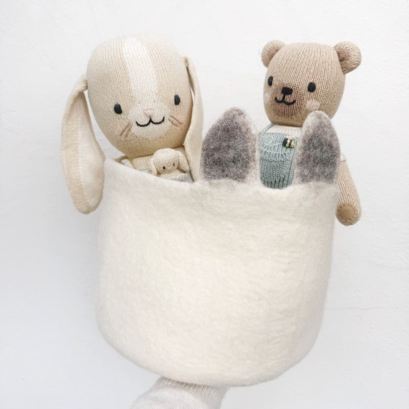 Felt basket holding a rabbit and bear soft toy