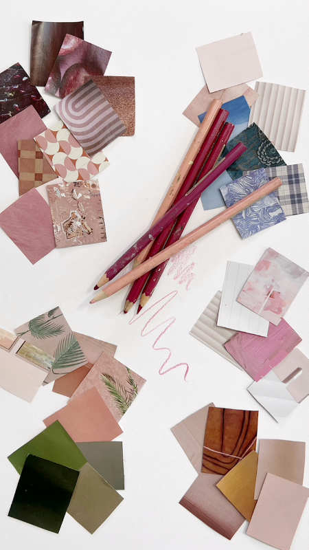 Coloured pencils and assorted pink paper swatches