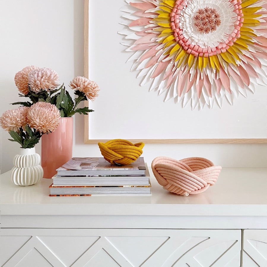 Framed Mondocherry paper flower artwork with vases and books
