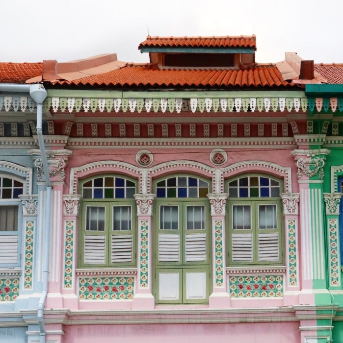 Colourful Singapore shophouse facade with floral tiles