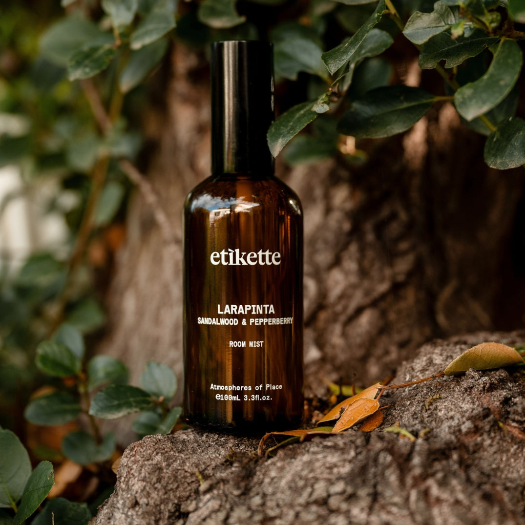 Etikette — room mist — Larapinta in sandalwood & pepperberry — bottle outdoors