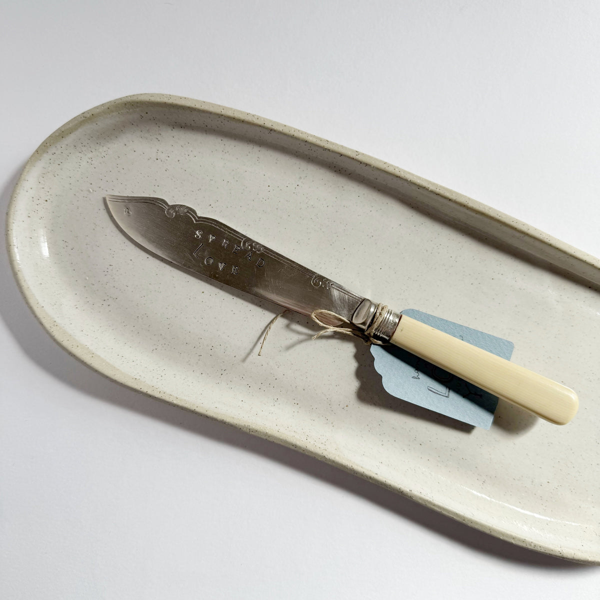 mondocherry - antique silverware butter knife | "spread love"