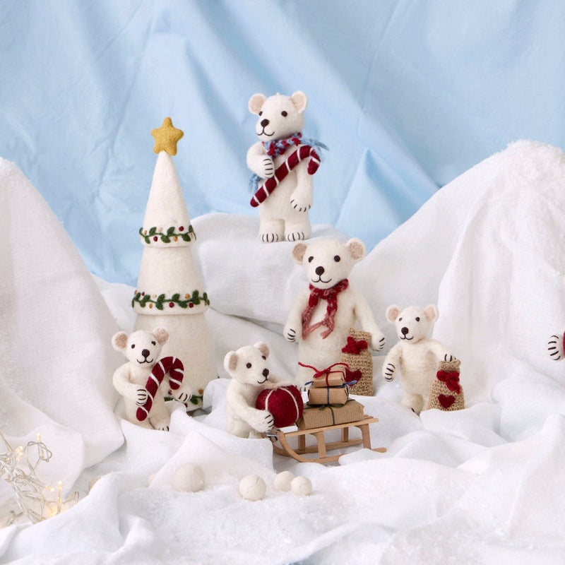 Gry & Sif — polar bear with candy cane — small — polar bear family arranged with a felt tree on snowy white fabric