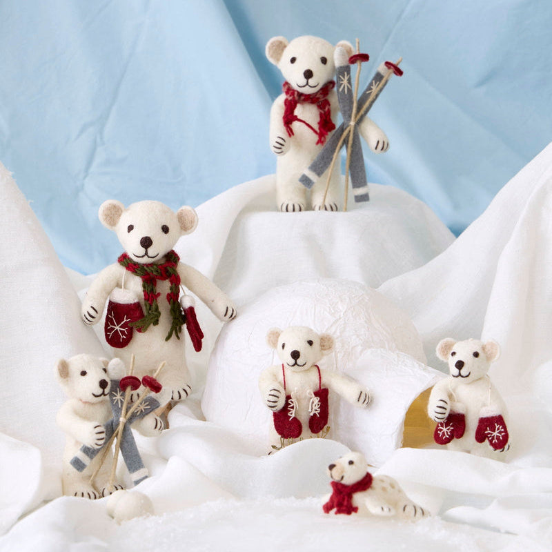 Gry & Sif — polar bear with mittens — small — polar bear family arranged with a felt tree on snowy white fabric