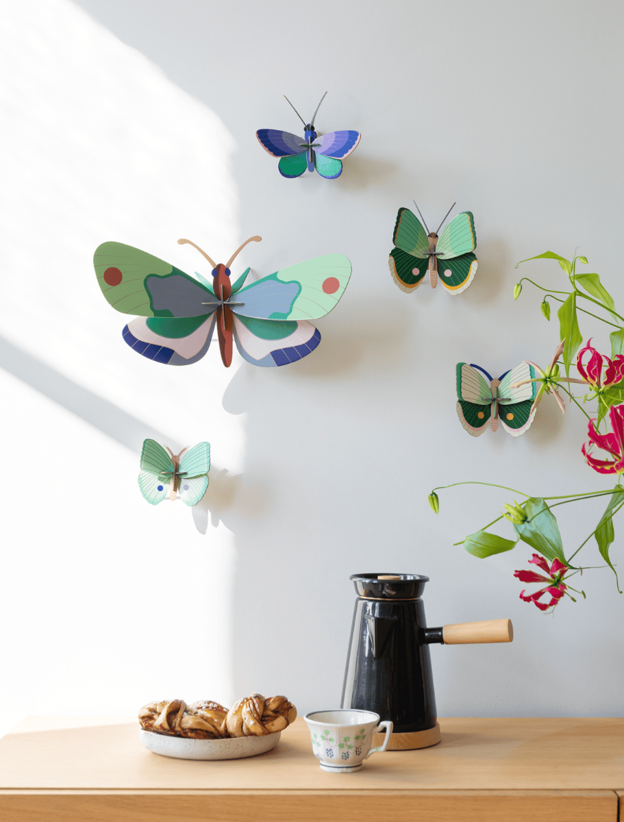 mondocherry studio roof blue copper butterfly - wall