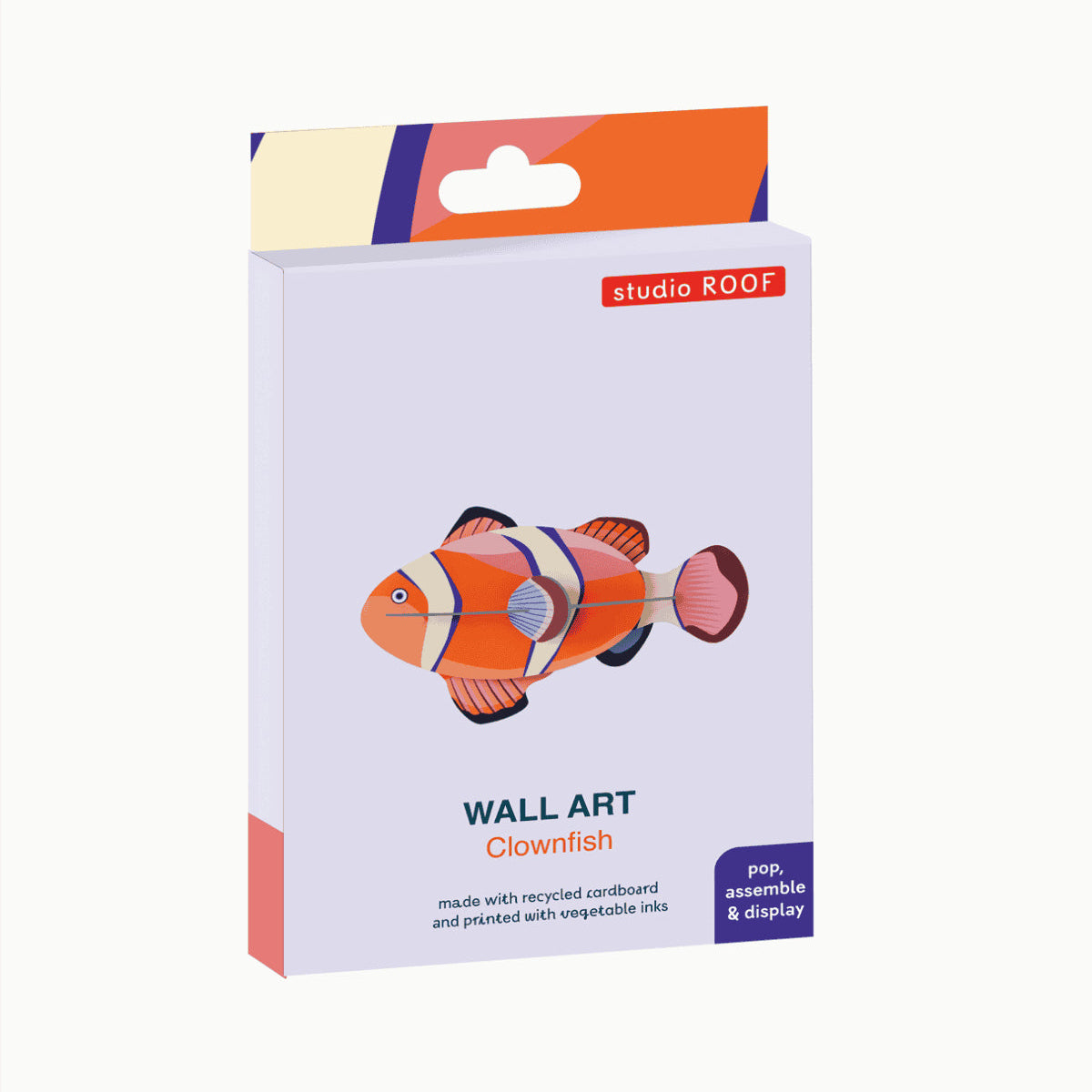 Packaging of Studio Roof wall art clownfish on a white background