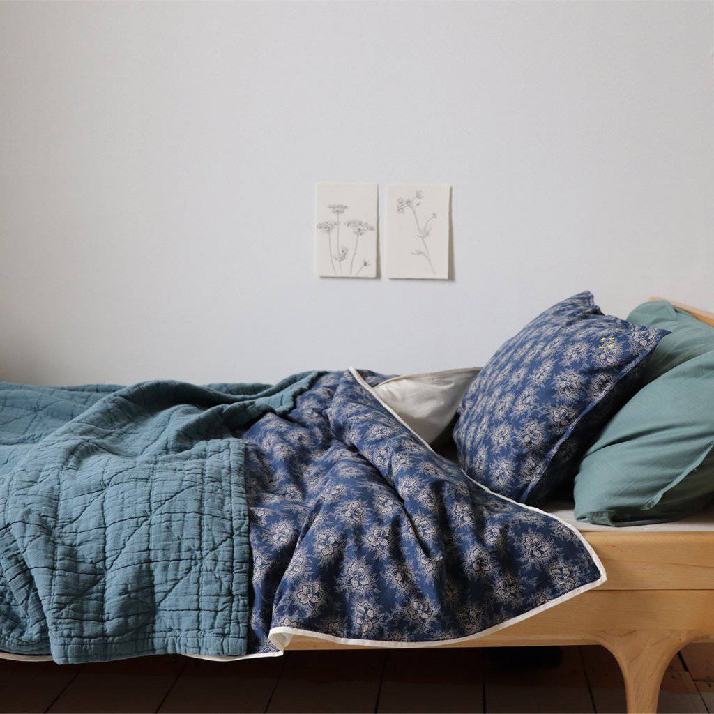 Camomile London | diamond single cotton blanket | airforce blue - bed