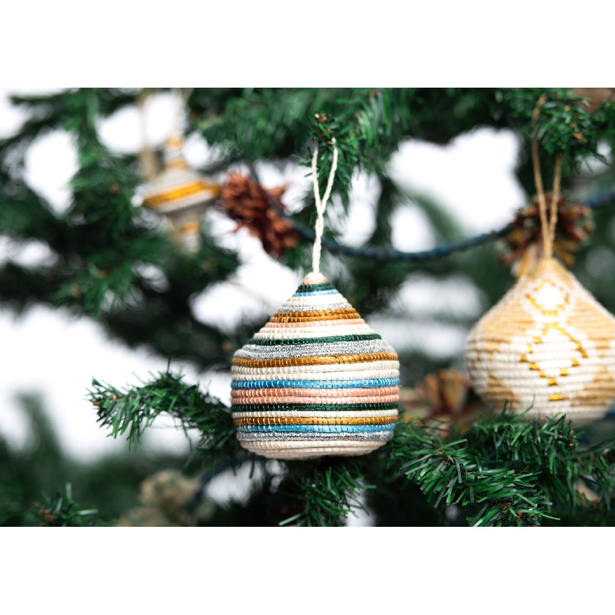 African woven bulb ornament | striped pastels - tree