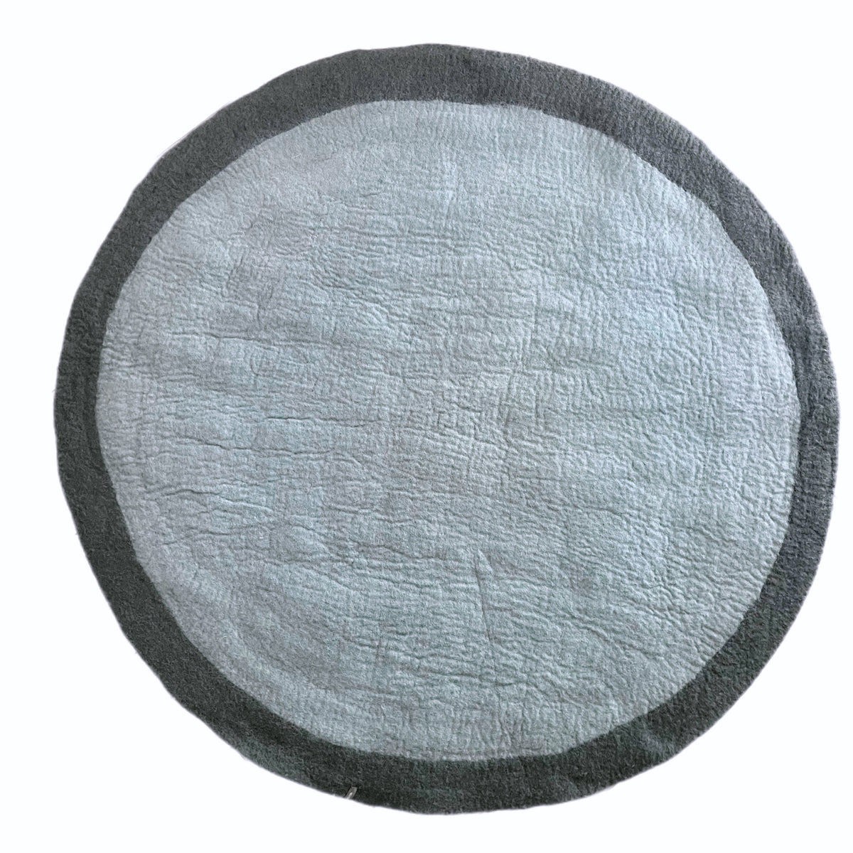 Muskhane | lumbini round rug | mineral blue / stormy grey