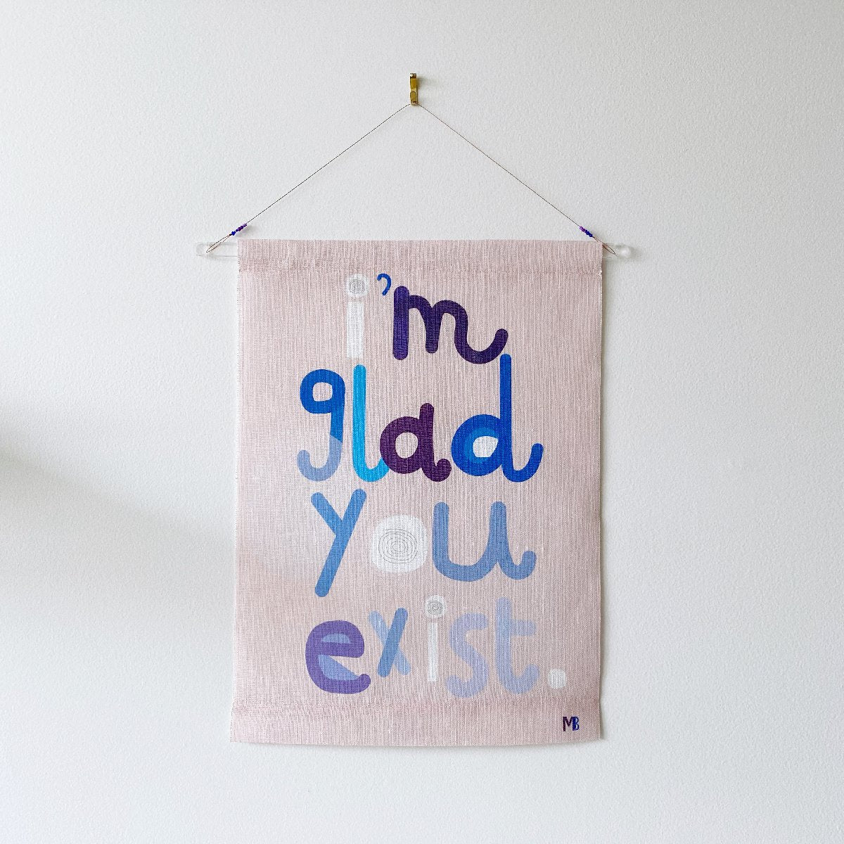 Miriam Bereson | glad you exist blue linen wall hanging | small
