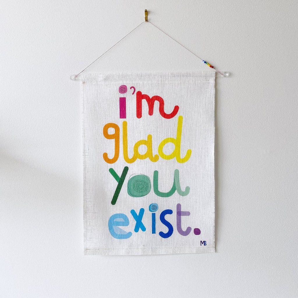 Miriam Bereson | glad you exist multicolour linen wall hanging | small