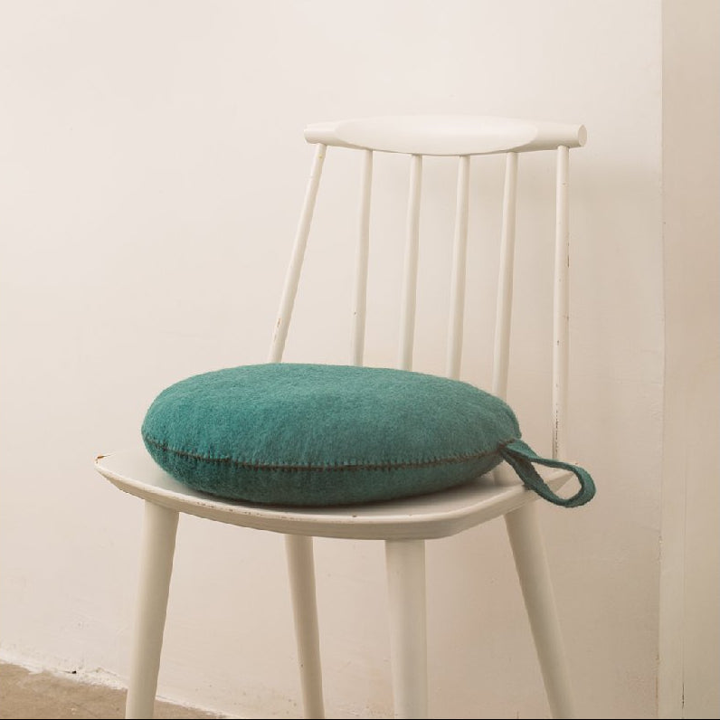Muskhane | nomad smartie cushion | turquoise pastel - chair