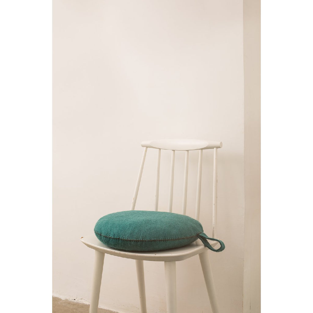 Muskhane | nomad smartie cushion | turquoise pastel - chair