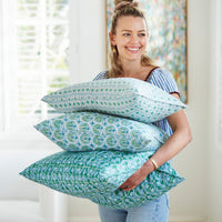 Walter G | valencia linen cushion | emerald - holding