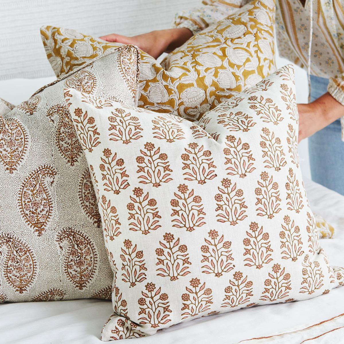 Walter G | paisley linen cushion | petal - mondocherry - bed