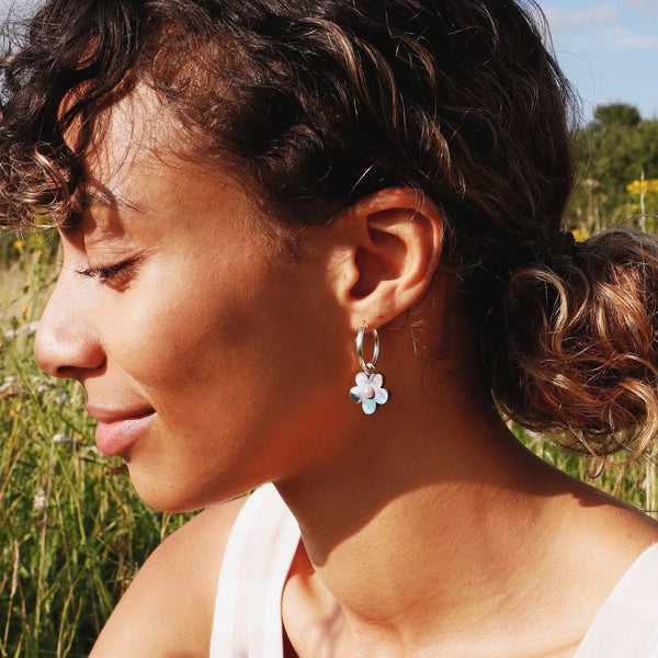 Wolf and Moon | mini bloom hoop earrings | mother of pearl blue - model