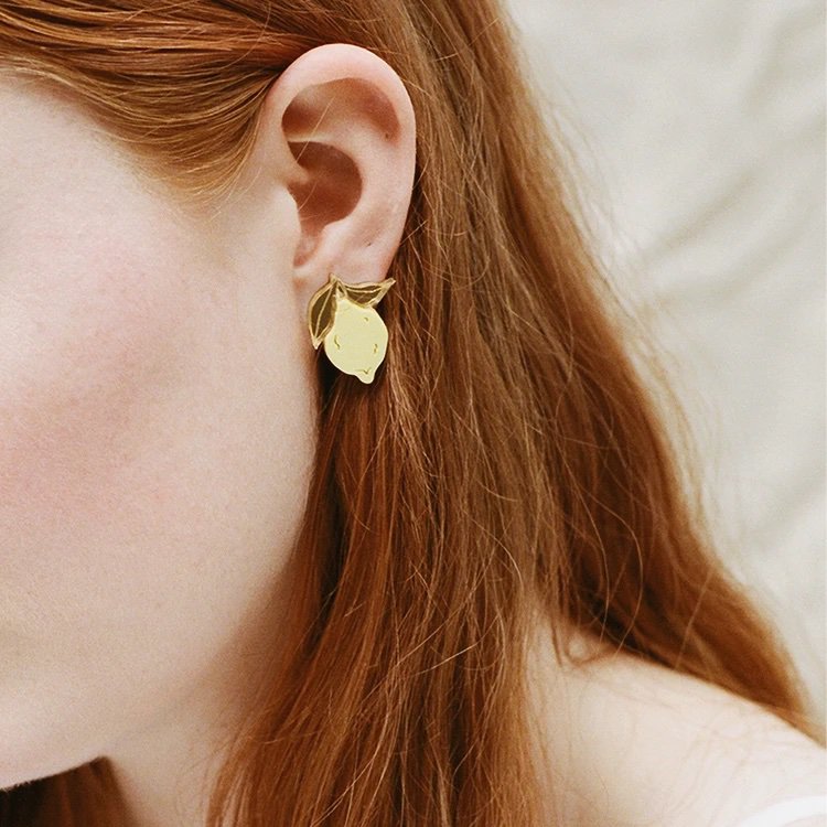 wolf_and_moon-mini-lemon-stud-earrings model close