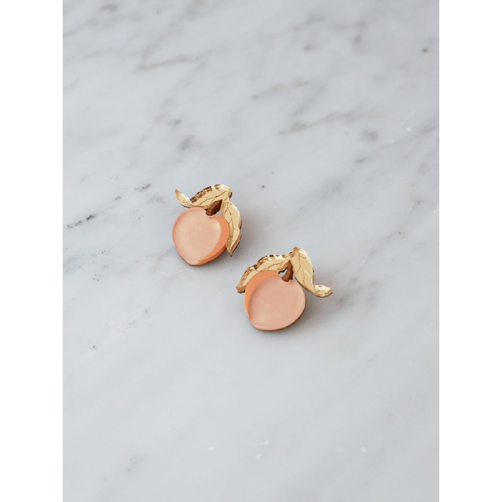 Wolf and Moon | mini peach stud earrings - side