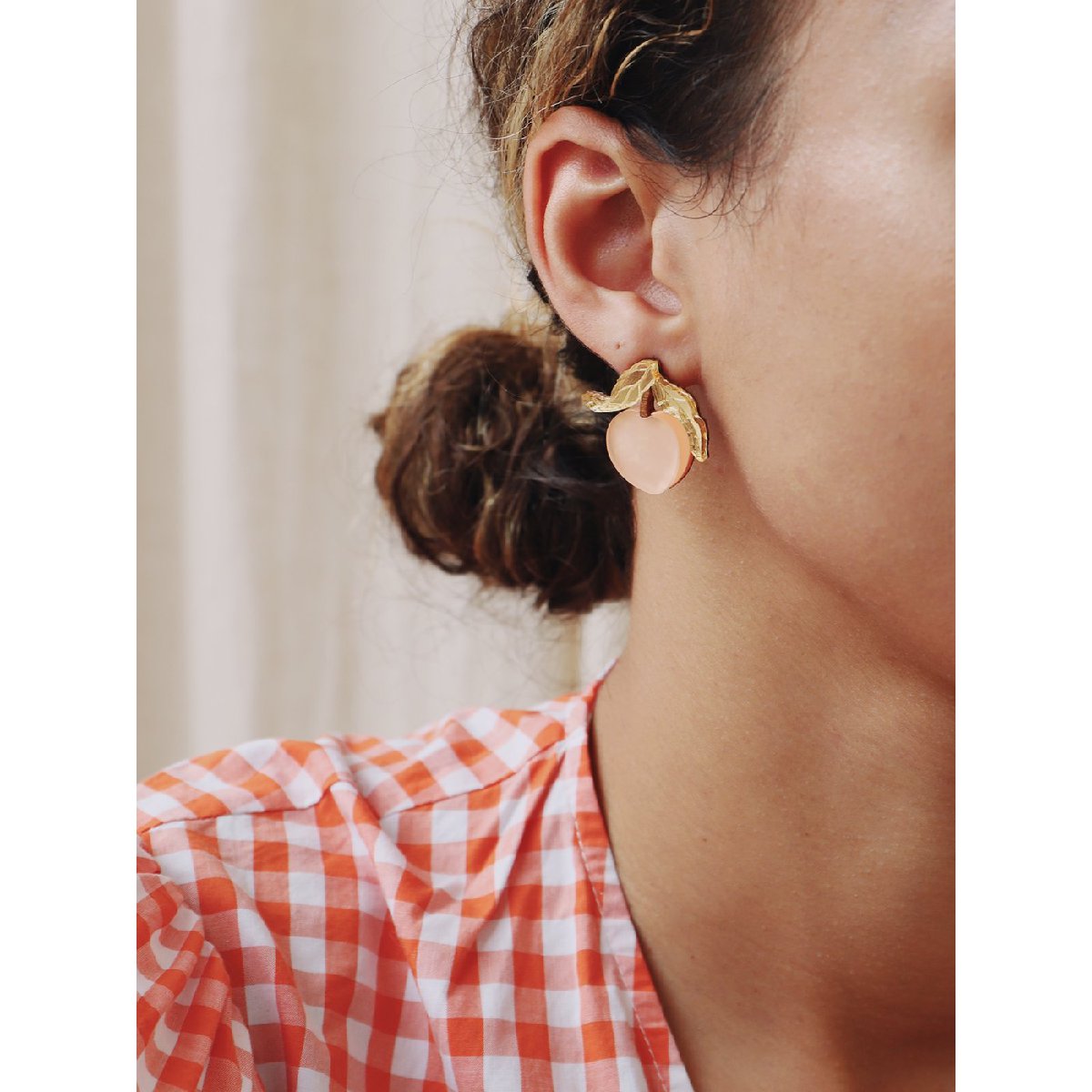 Wolf and Moon | mini peach stud earrings - wear