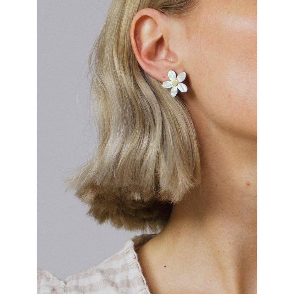 Wolf and Moon | mini orange blossom stud earrings | mother of pearl - wearing