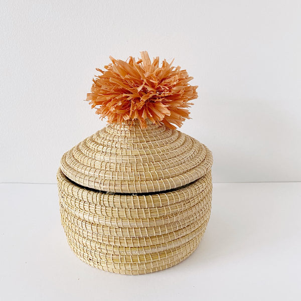 African woven pom pom lidded basket | peach #1