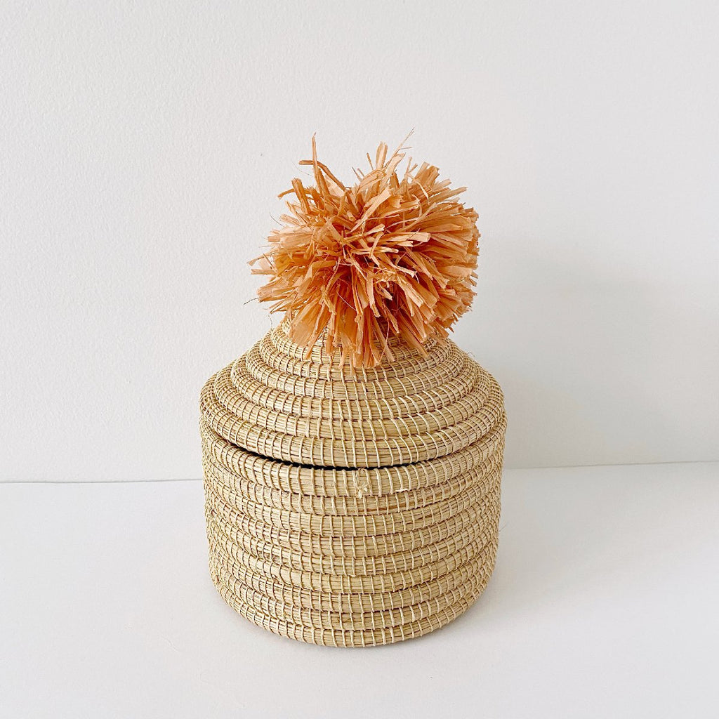 African woven pom pom lidded basket | peach #2