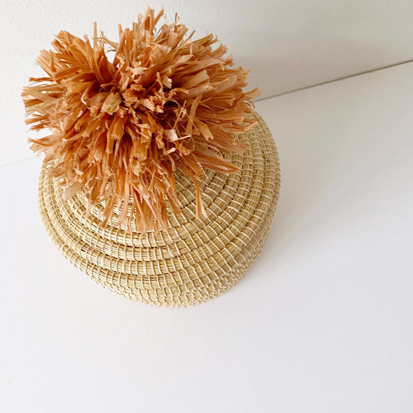 African woven pom pom lidded basket | peach #3 - top