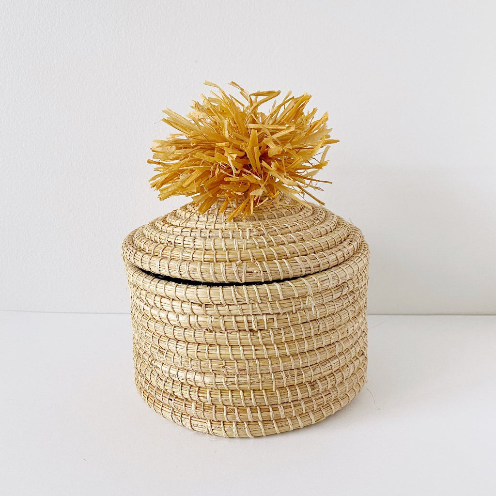 African woven pom pom lidded basket | sunset #1